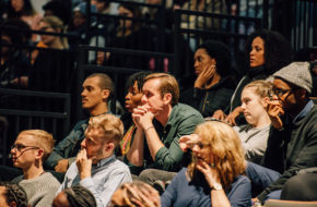 An audience listening in the Riley Smith Theatre