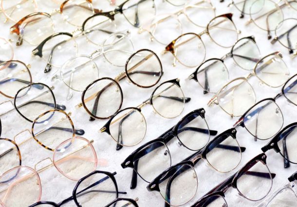 Glasses in a rack at an opticians