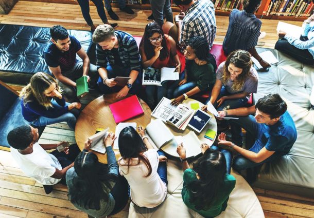 An image of several young people from above during a study session
